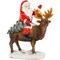 Northlight Santa Claus on a Reindeer Holding a Frosted Pine Tree Christmas Figurine - 8.25"